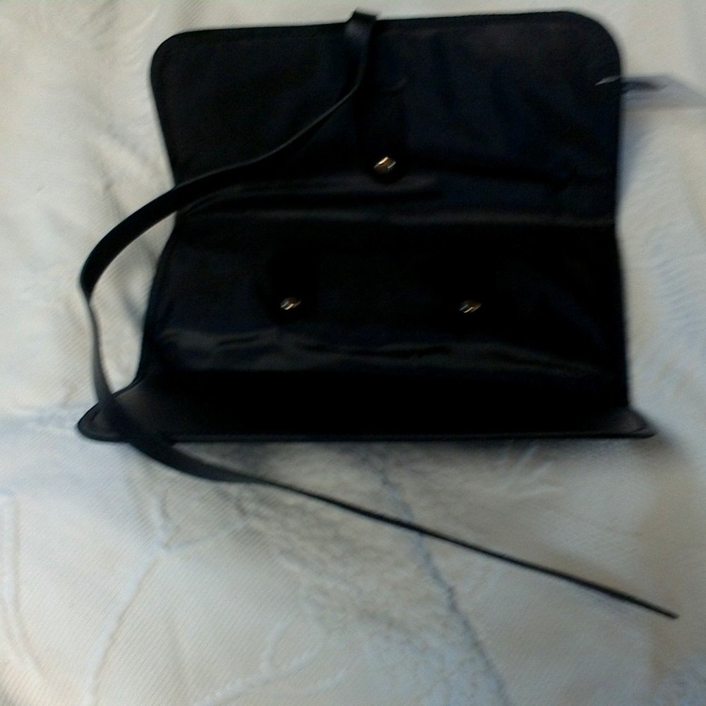 NWT Leather Organizer with a tie .